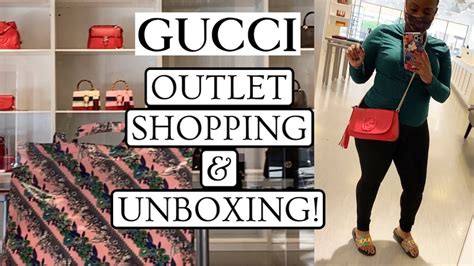 does gucci have outlet stores.